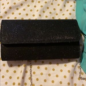Small hand purse with black sparkles and chain